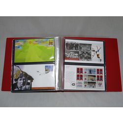 red unisafe fdc album with 101 different official canada post first day covers from january 2007 to may 2010