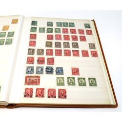 used brown stockbook including canadian stamps