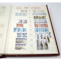 used red stockbook including canadian stamps