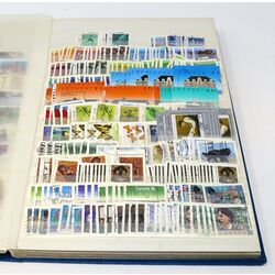 canada used stamp collection in a blue 32 page stockbook